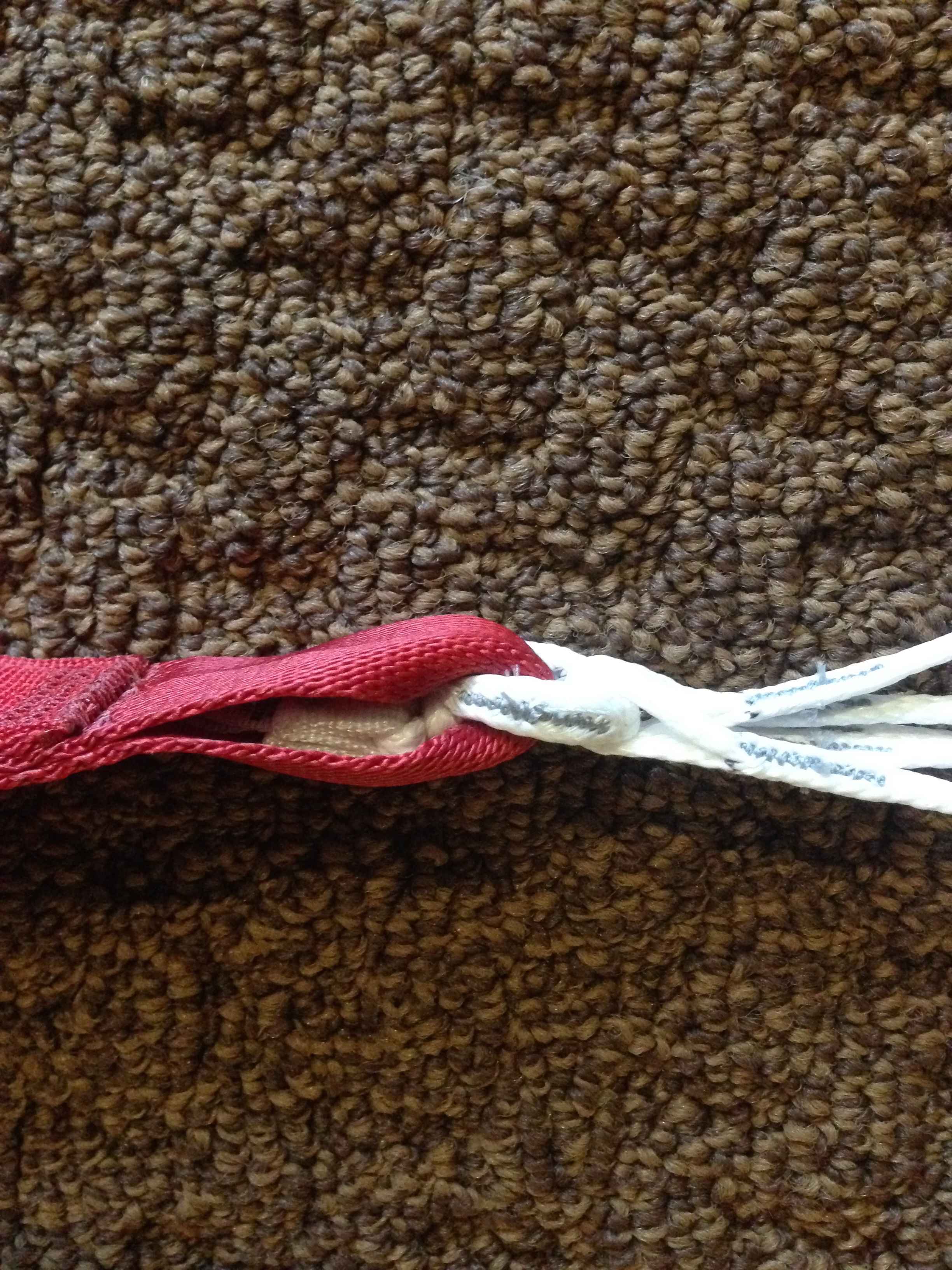 Slinks side view, correct, with the tab neatly tucked away in the riser top