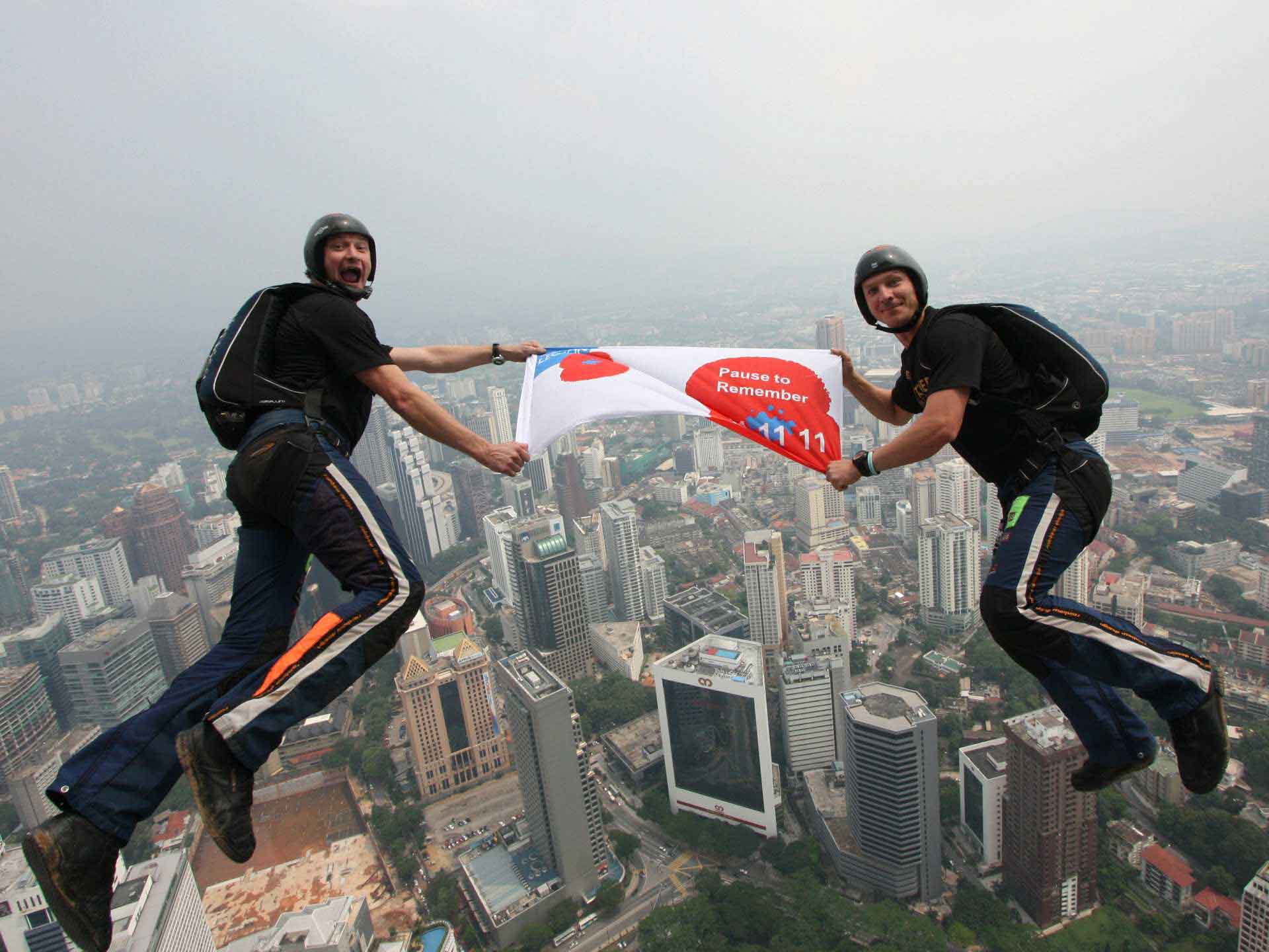 Kuala Lumpur jump by Al Macartney and Smudge