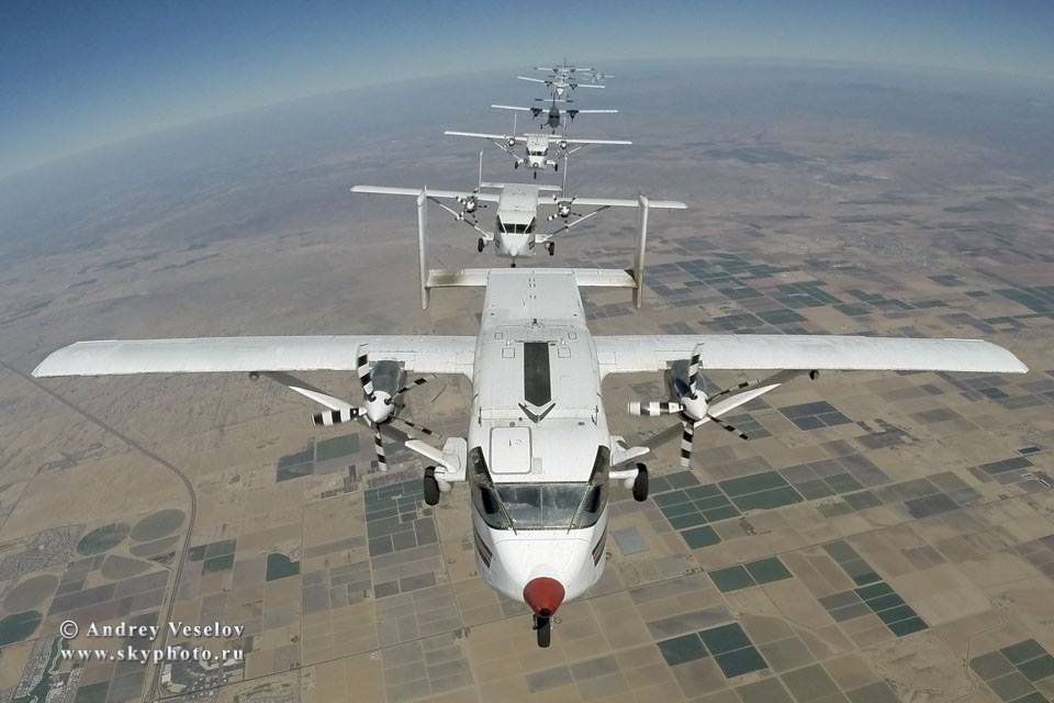 Record attempts were made from 4 Skyvans and 6 Twin Otters. The pilots' formation flying was superb – tight and consistent
