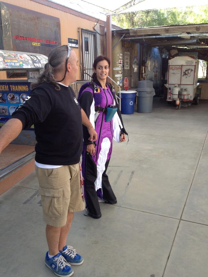 Author Douglas Spotted Eagle training a first jump student on her flight plan