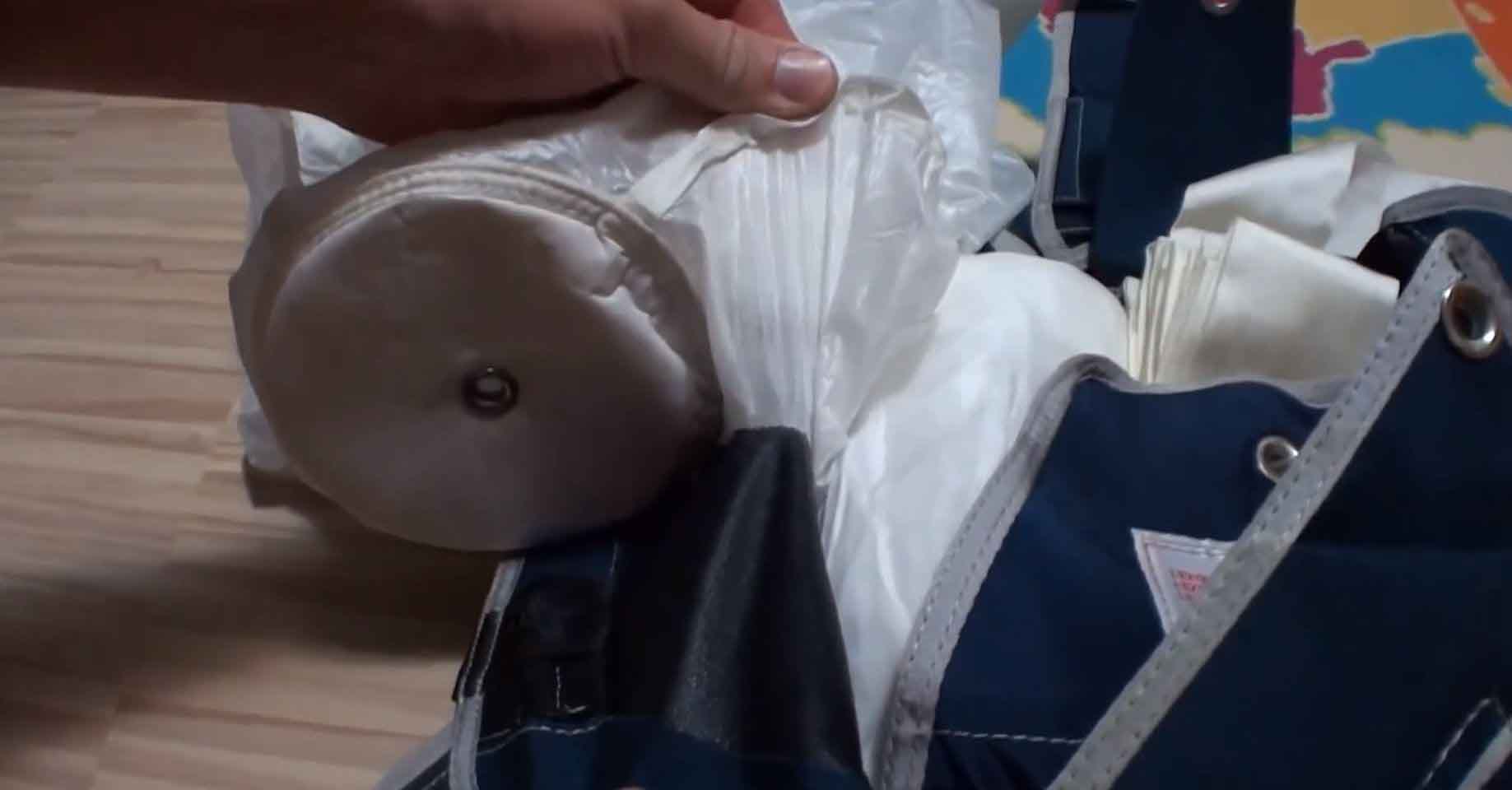 Pilot chute fabric is stuck to container fabric