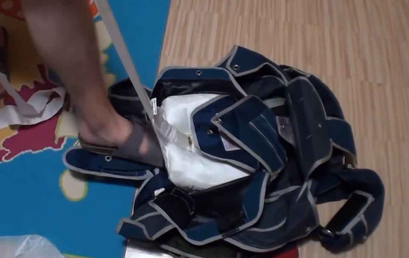 Some force is necessary to pull the free bag from the tray
