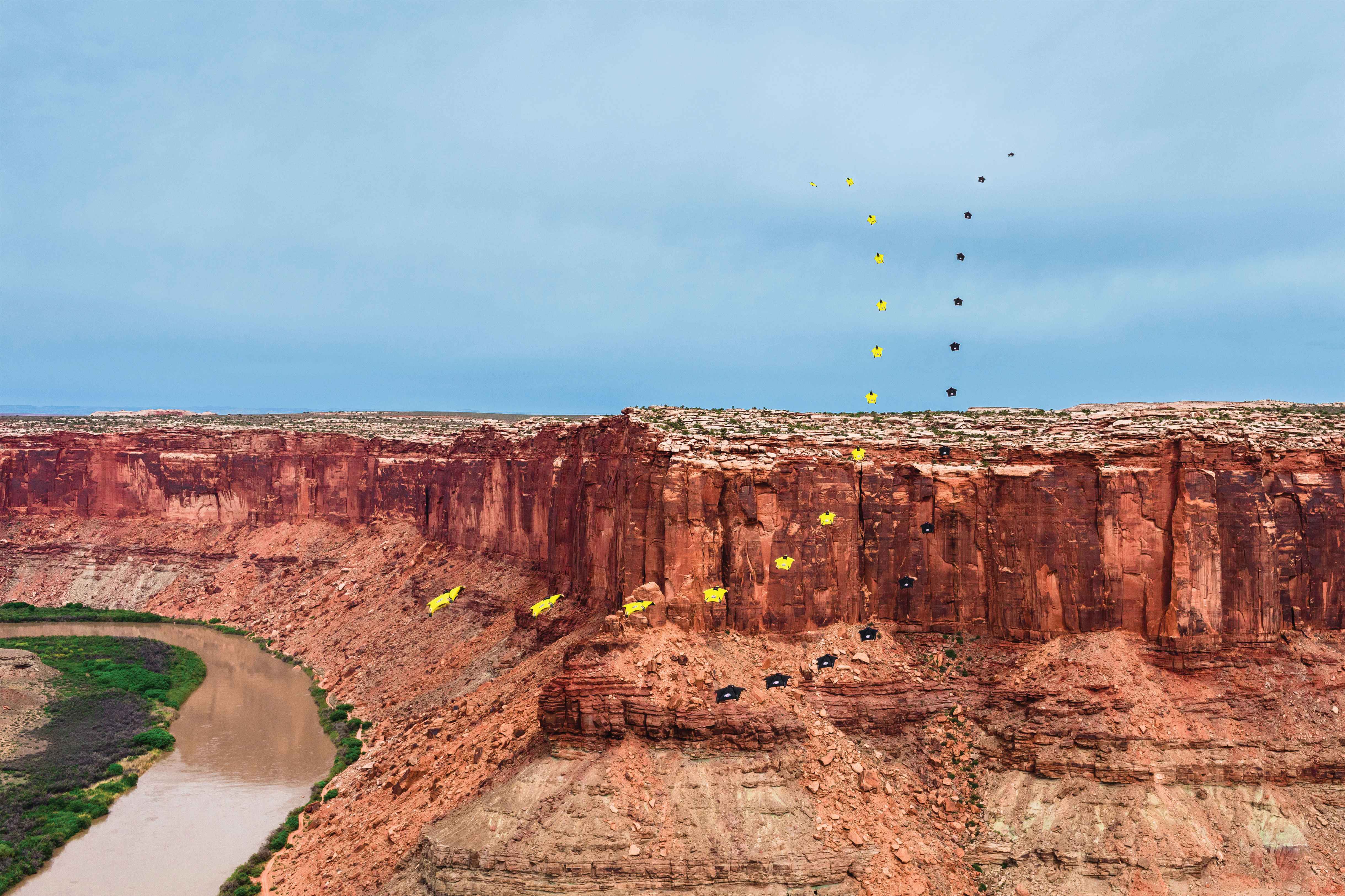 Sequence of Noah Bahson (yellow) and Matt Gerdes (black) going up in Moab, Utah