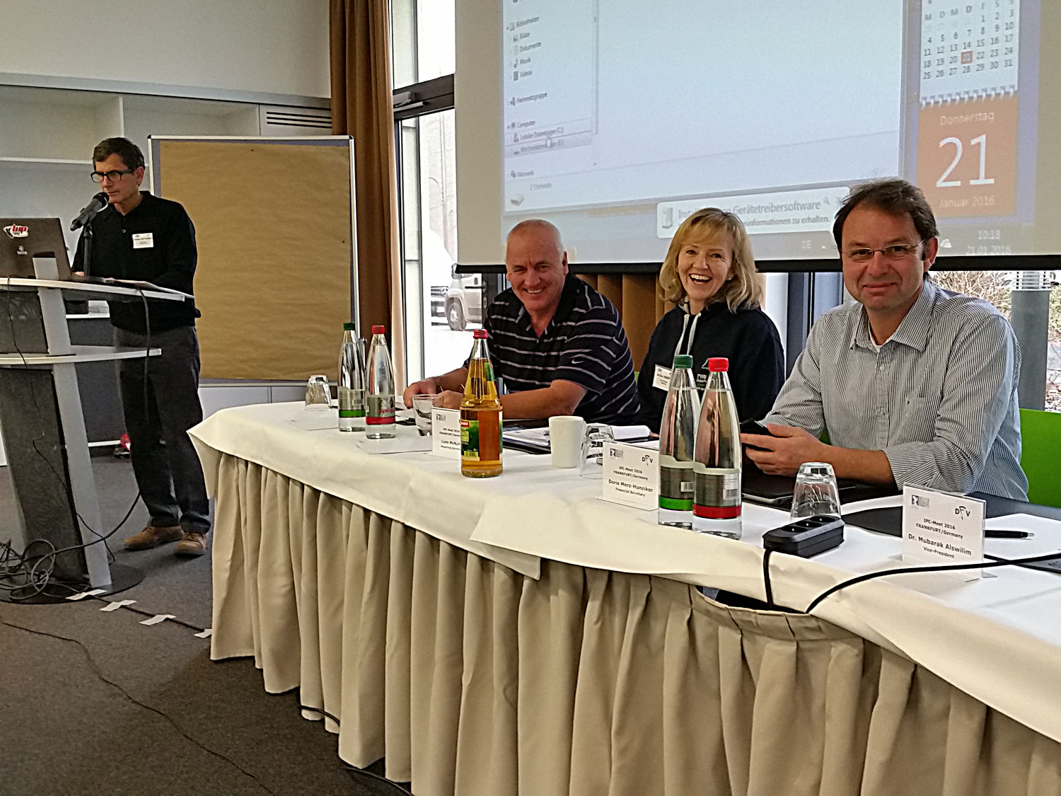 James Hayhurst (presenting) & WS Cttee: John Smyth, Jackie Harper & Klaus Rheinwald