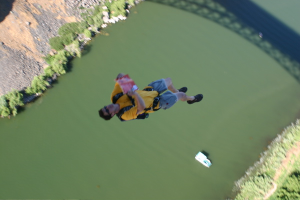 Author Johnny Utah does a gainer while 'reading' a book